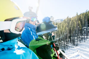 generational-wealth-family-skiers-on-chairlift